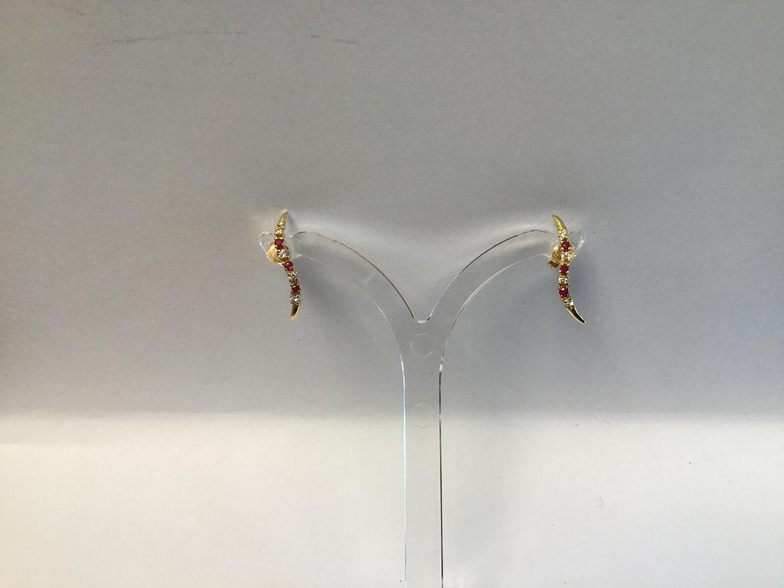 # Yellow gold earrings with ruby and circlet