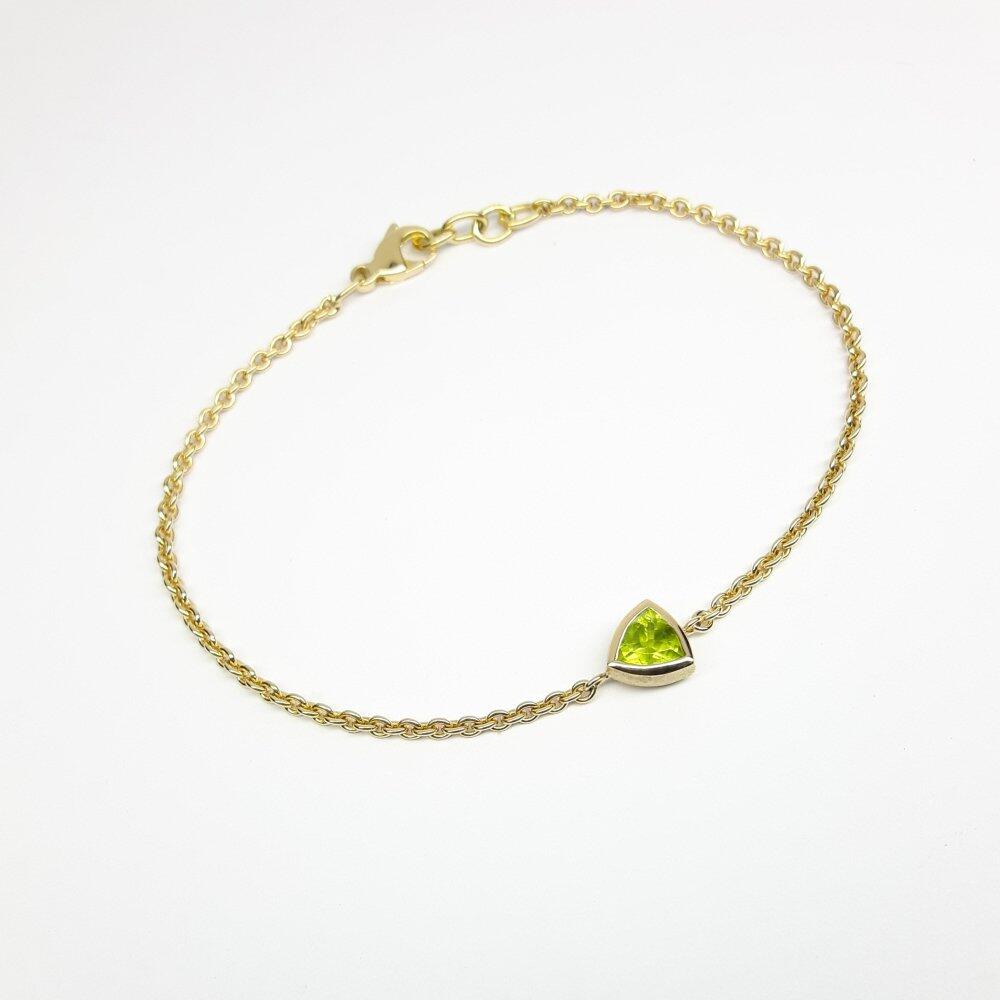 Armkettchen aus 18kt Gelbgold und Peridot. Unikat.