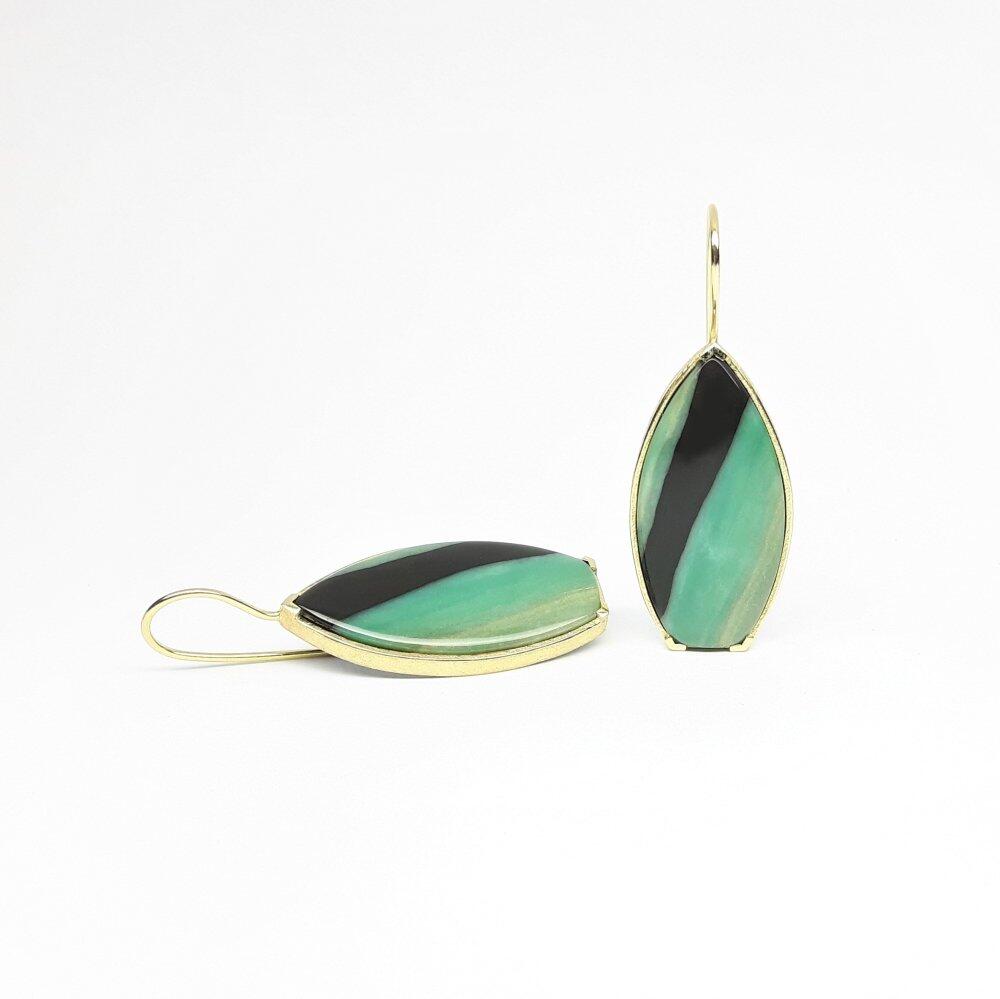 Earrings in 18kt yellow gold with opalized wood. Unique piece.