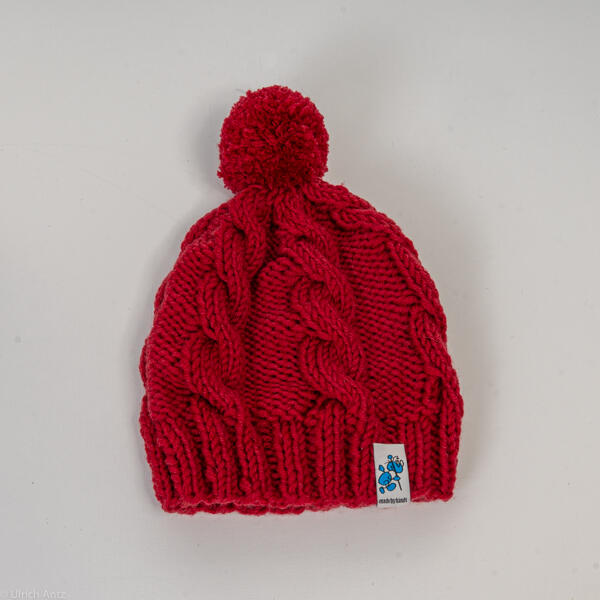 Bonnet enfant en torsade, tricoté à la main