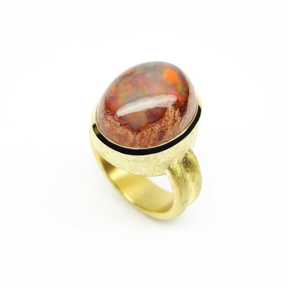 18k yellow gold ring with Mexican fire opal, very luminous. One of a kind.