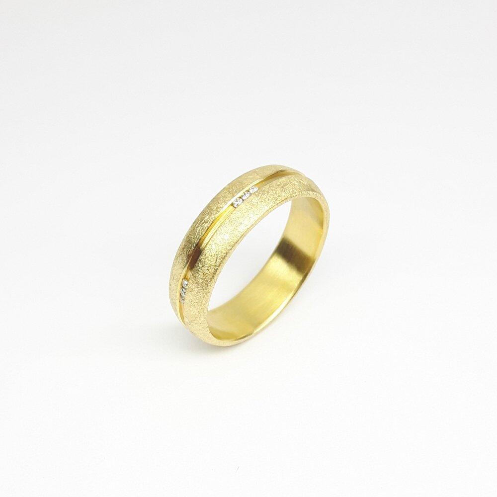 Bague en or jaune 18kt et 15 brilliants.