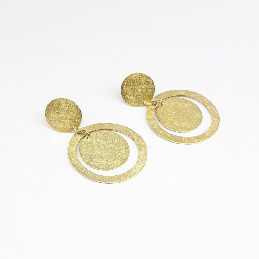 "round around", stud earrings in 18kt yellow gold.