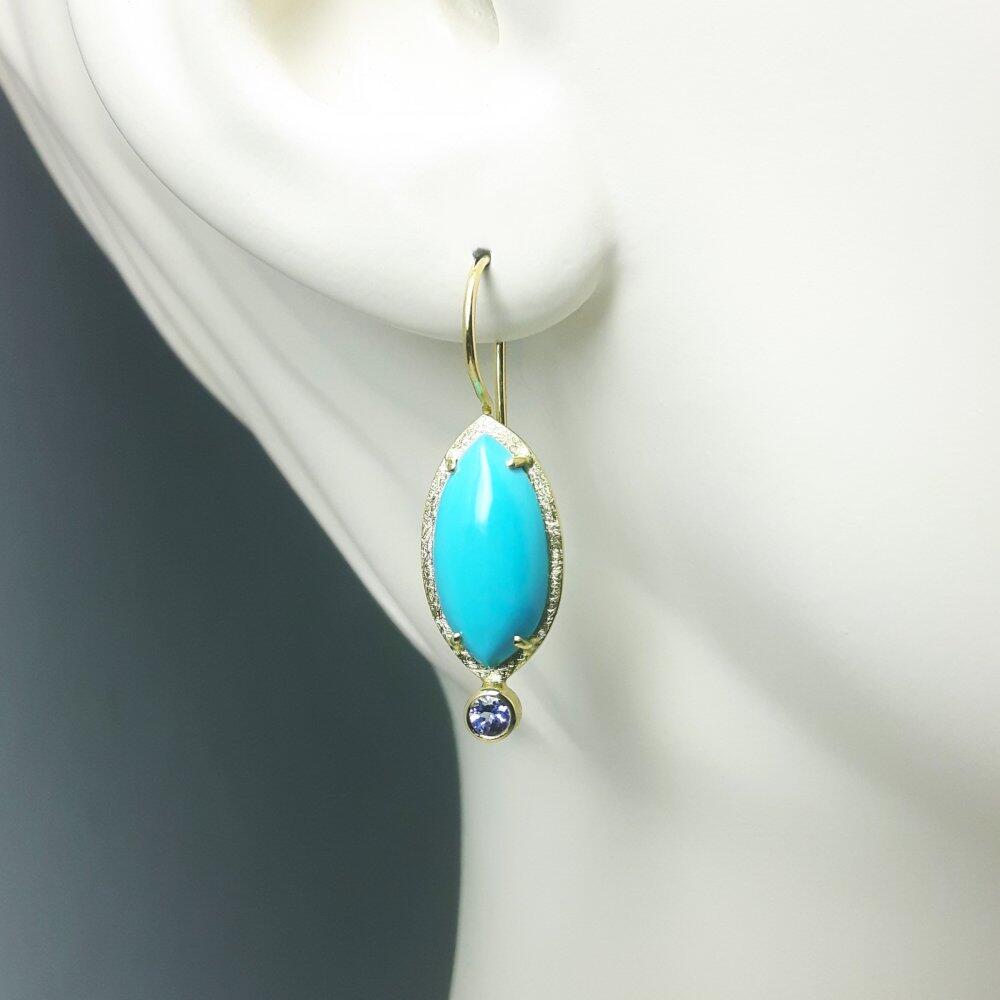 Earrings made of 18kt yellow gold, fine turquoise, and tanzanite. One-of-a-kind.
