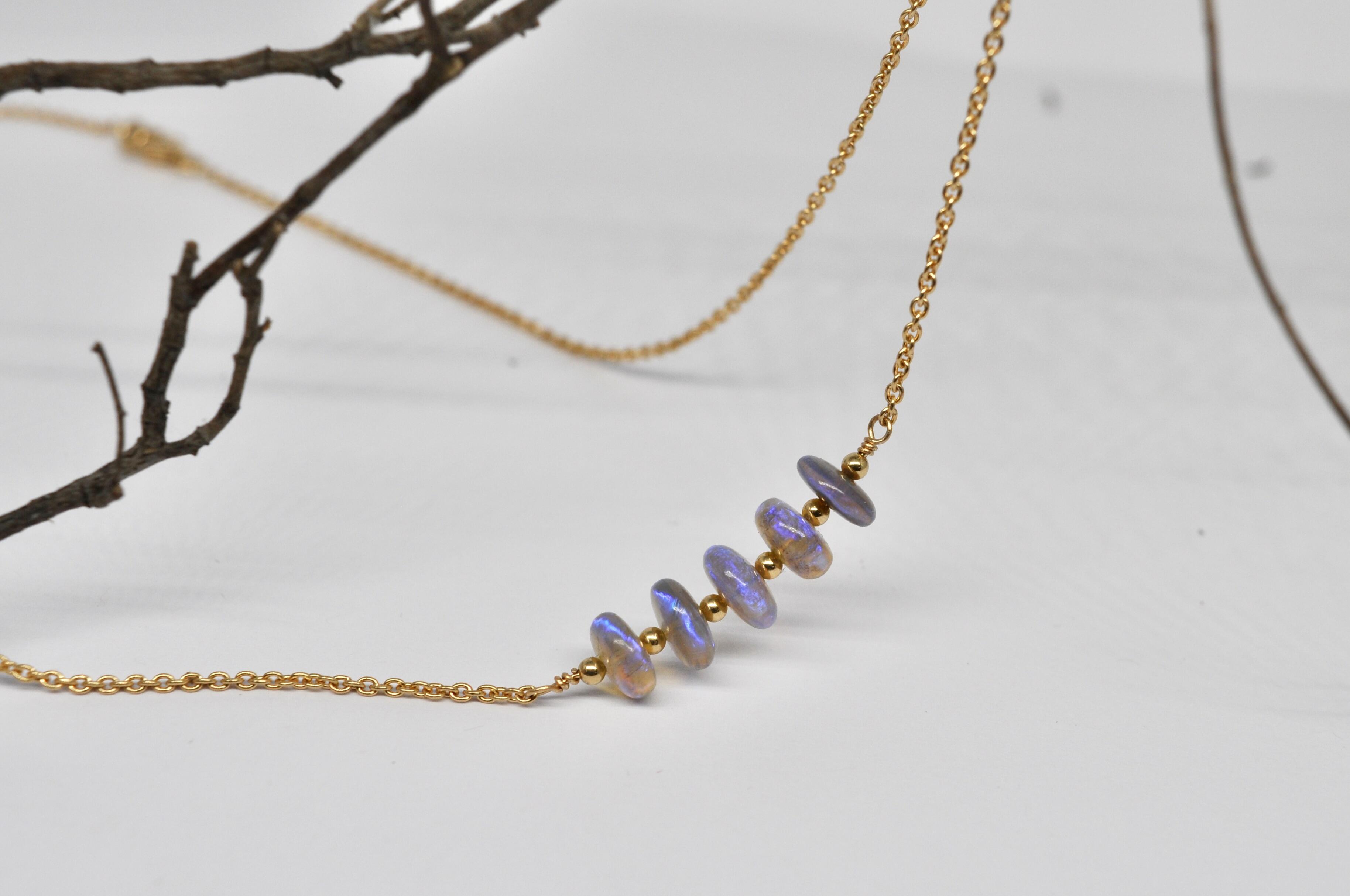 Black opal necklace, yellow gold