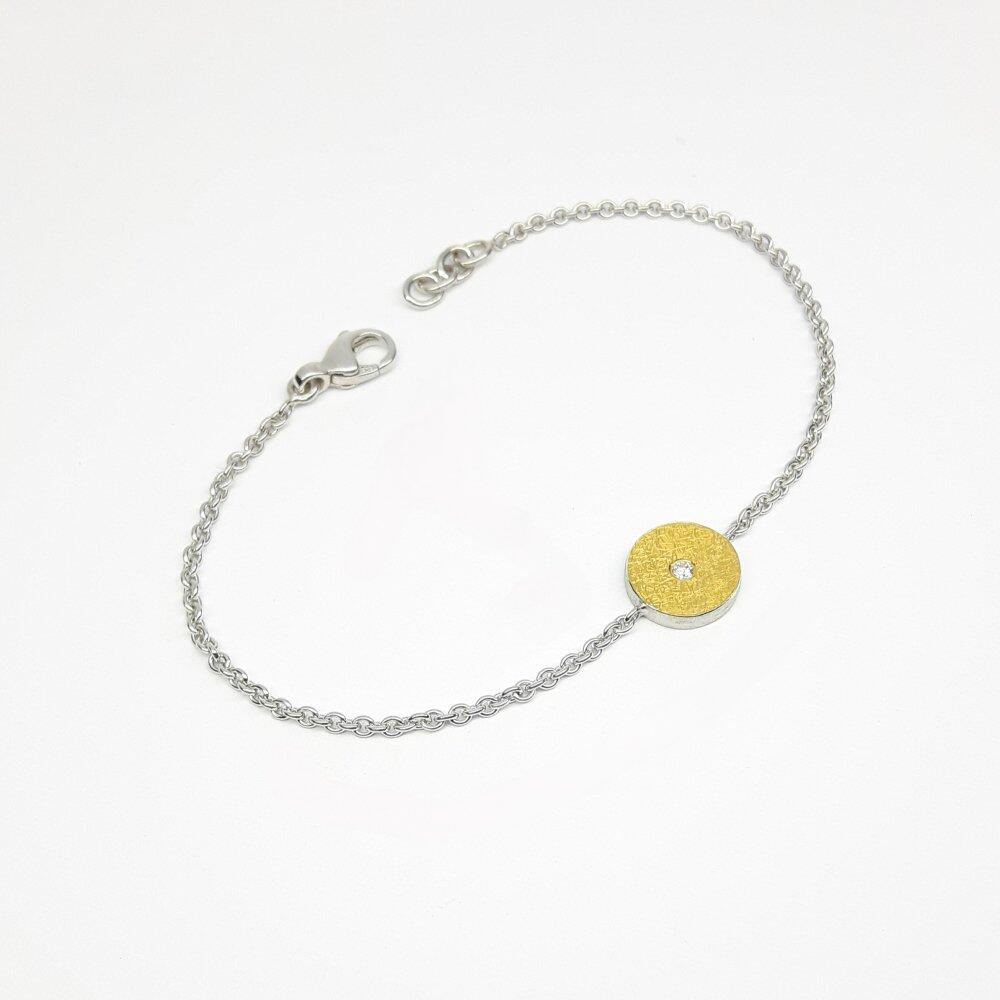 Armband aus Feingold, 925er Silber und Brillant.