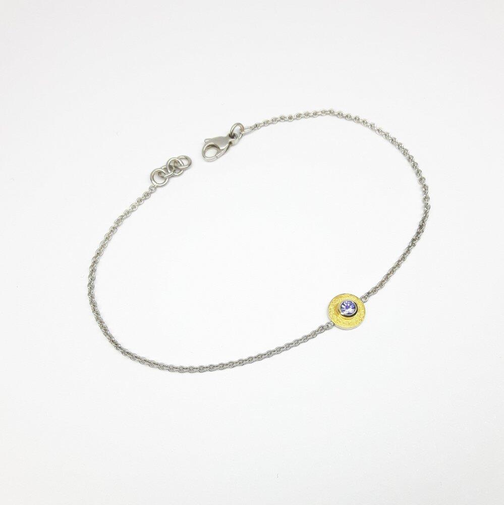 Armband aus Feingold, 925er Silber und Tansanit.