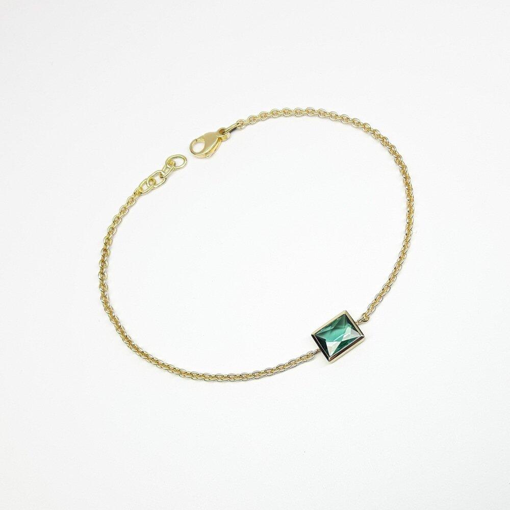 Armkettchen aus 18kt Gelbgold und blau-grünem Turmalin. Unikat.