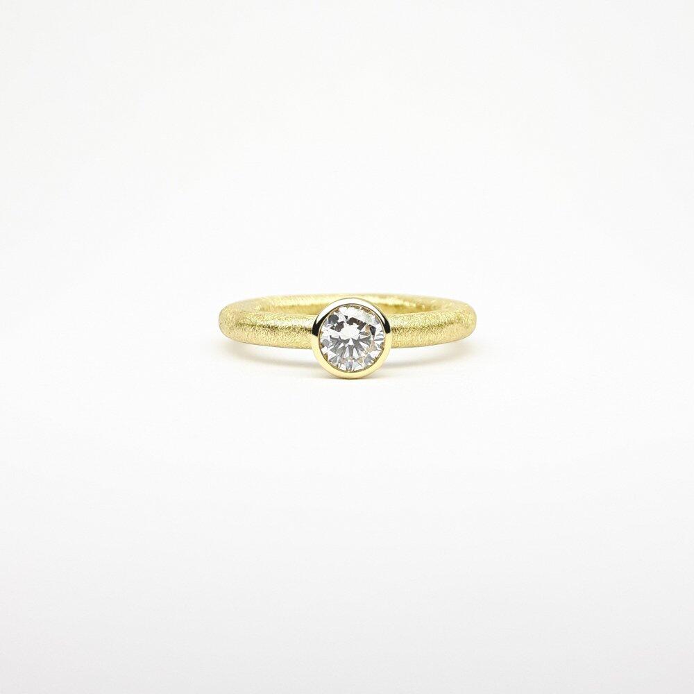 "combiring small", or jaune 18kt et diamant 0,50ct.