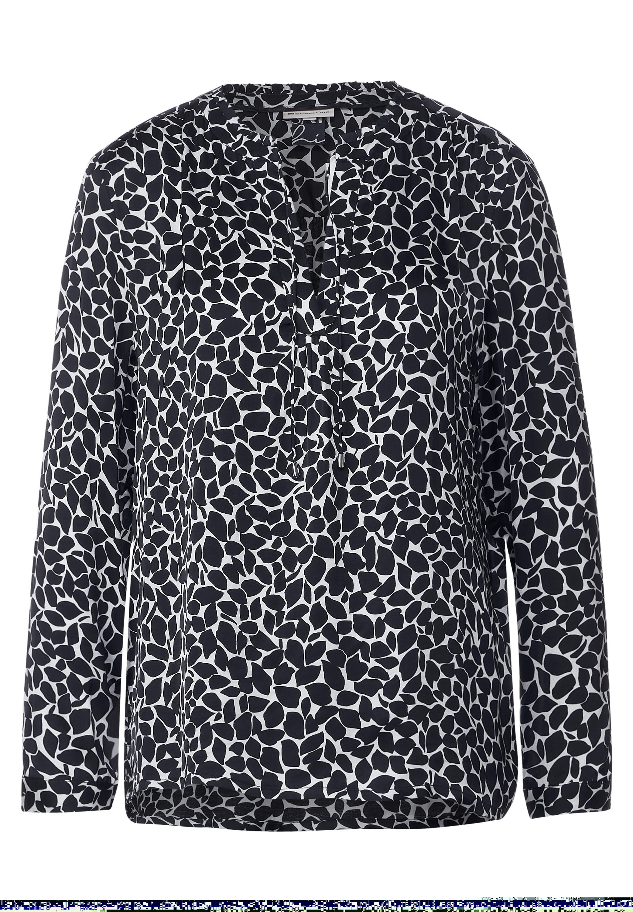 Blouse satinée minimaliste à volants