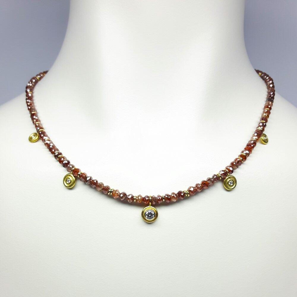 "shine like a diamond", necklace made of faceted diamond rondelles, brilliant cut diamonds, and 18kt yellow gold. Unique piece.