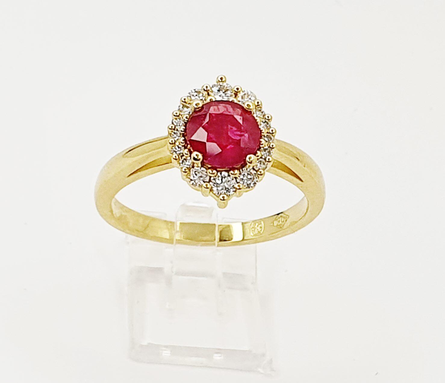 Yellow gold halo ring with 0.97ct ruby and 0.24ct natural diamonds