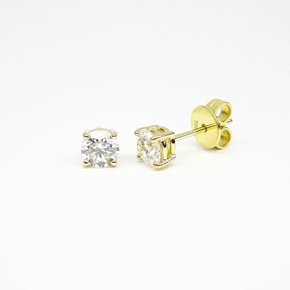 18k yellow gold earrings featuring a total of 1.00 ct of brilliant-cut diamonds.