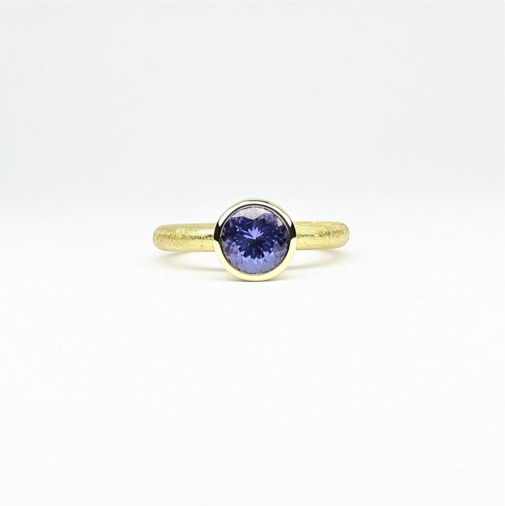 'combiring medium', 18kt Gelbgold und Tansanit Ø7mm.