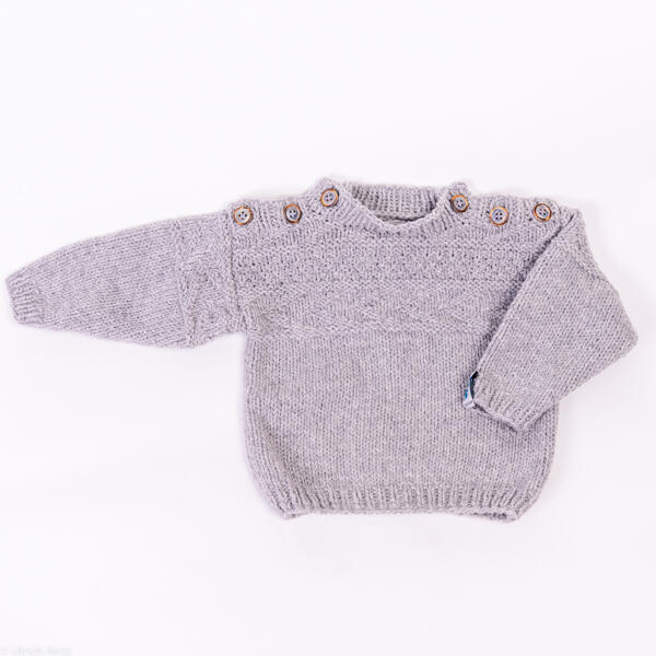 Baby- oder Kleinkindpullover, handgestrickt