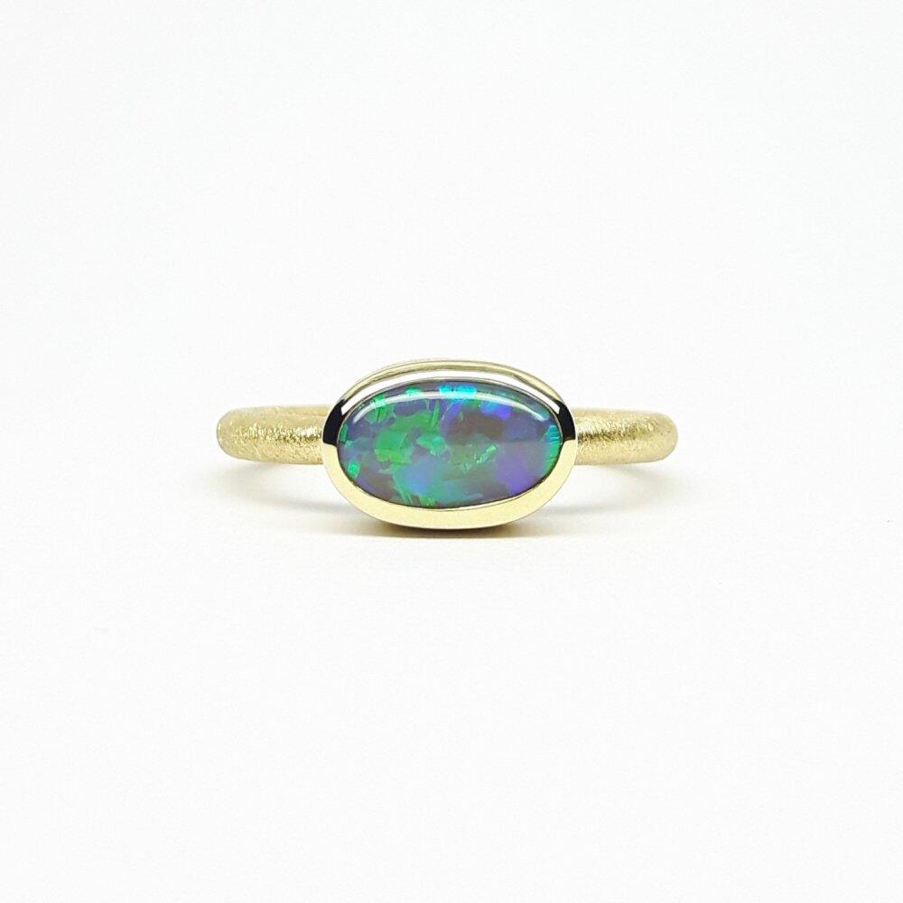 18k yellow gold and black opal ring. One of a kind.