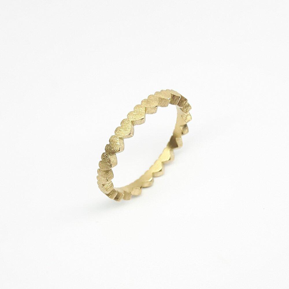 "heartbeats", ring made of 21 hearts, 18kt yellow gold.