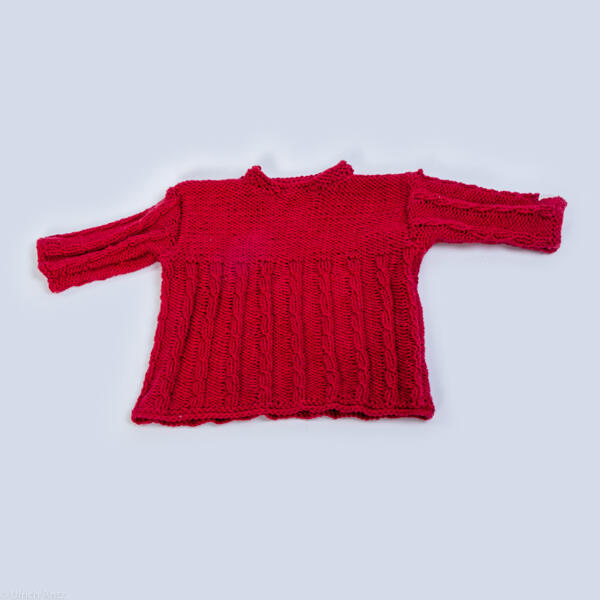 Baby sweater with cables and button placket, hand-knitted