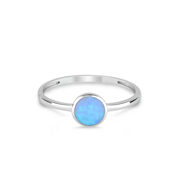 # 18K white gold ring with blue opal