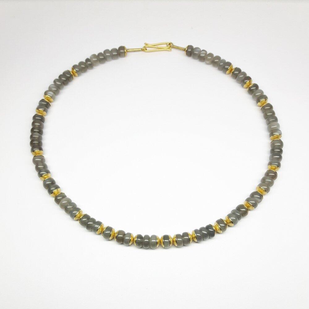 Necklace made of luminous gray moonstone and 18kt yellow gold. Unique piece.