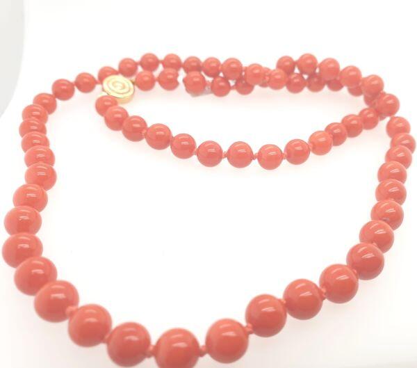 # Collier 50cm corail 6-6.5mm avec fermoir or jaune 18K