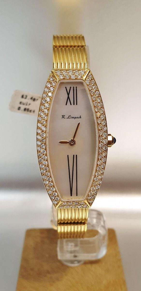 # Damenuhr aus 63,4 g Gelbgold, ovale tonneauform, 18 Karat, Zifferblatt aus Perlmutt, handgefertigt in unseren Werkstätten, besetzt mit brillanten Diamanten