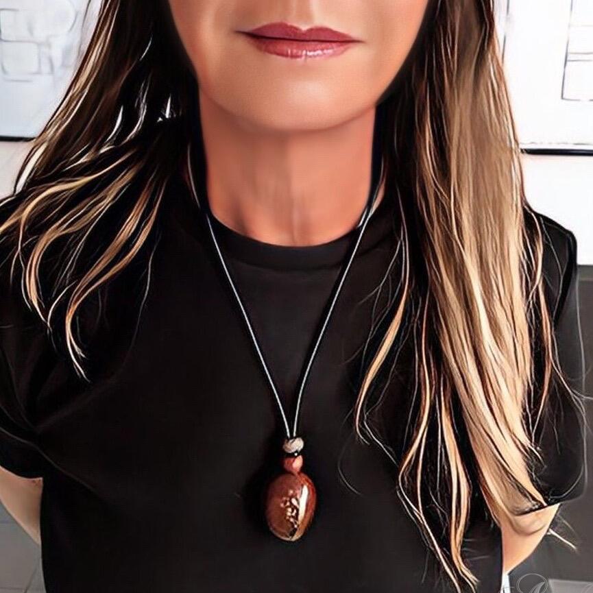 Brown leather necklace with natural Tagua nut