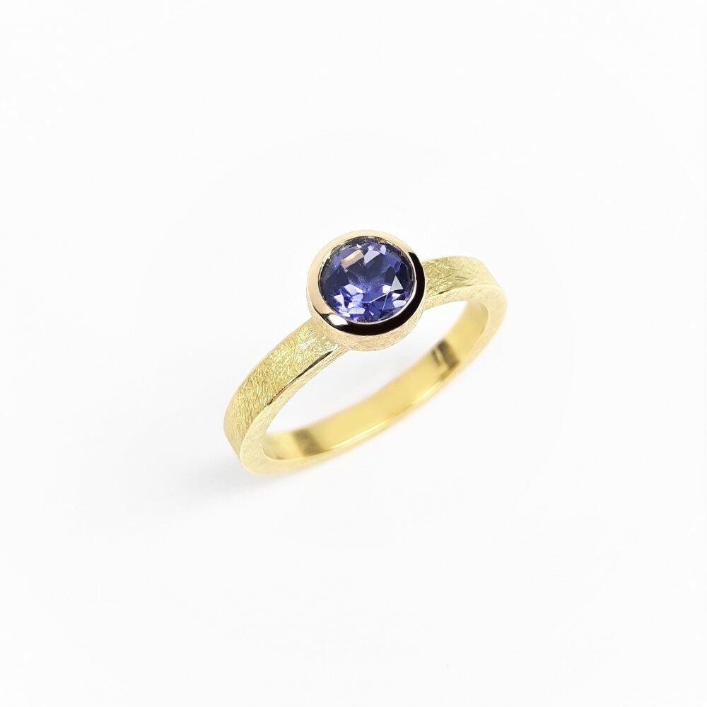 "combiring small", or jaune 18kt et tanzanite. Pièce unique.