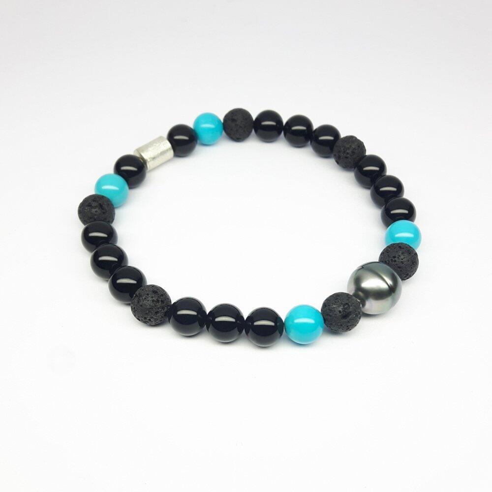 Bracelet made from onyx, turquoise, lava stone, Tahitian pearl, and 925 sterling silver. One of a kind.