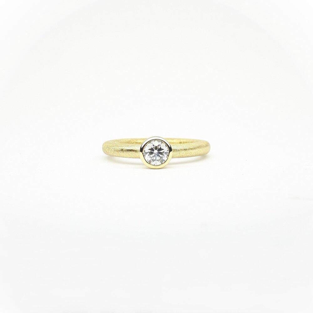 "combiring small" aus 18kt Gelbgold mit Brillant 0,40ct.