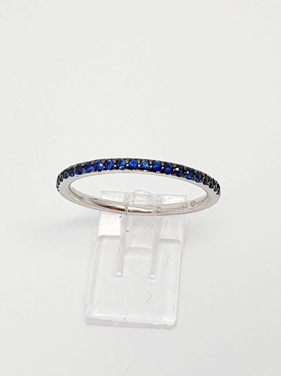 # Bague alliance or blanc 18K avec 0.33ct saphire bleu
