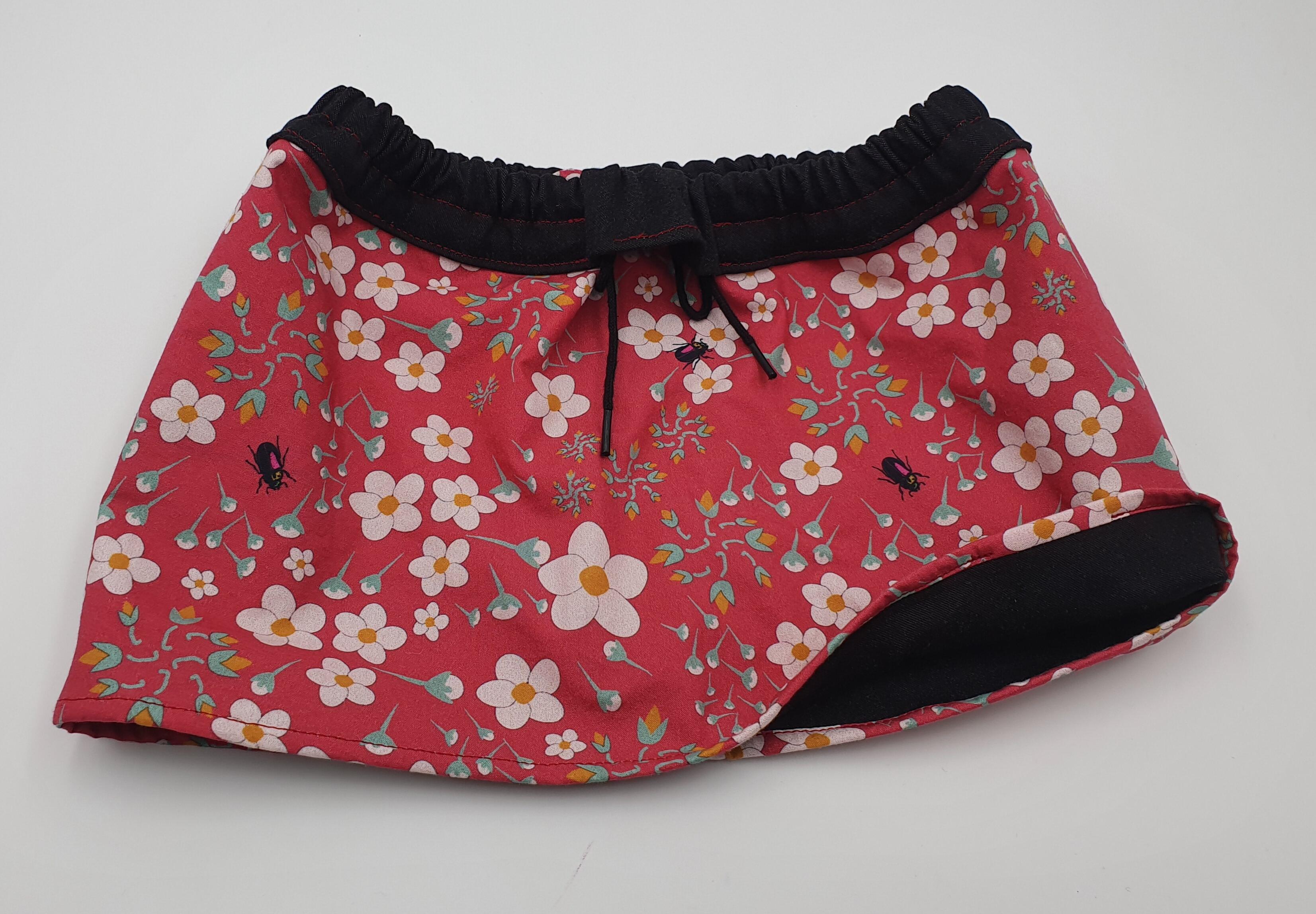 Reversible and evolving child skirt "Flowers and beetles