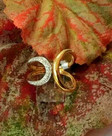 # Yellow and white gold open ring with natural diamonds 0.18 ct. 6.62gr.