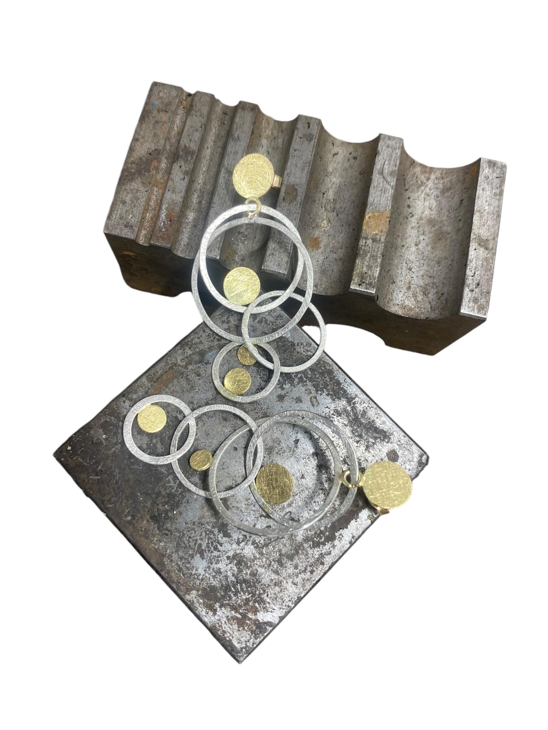 Ohrringe aus Gelbgold und Silber