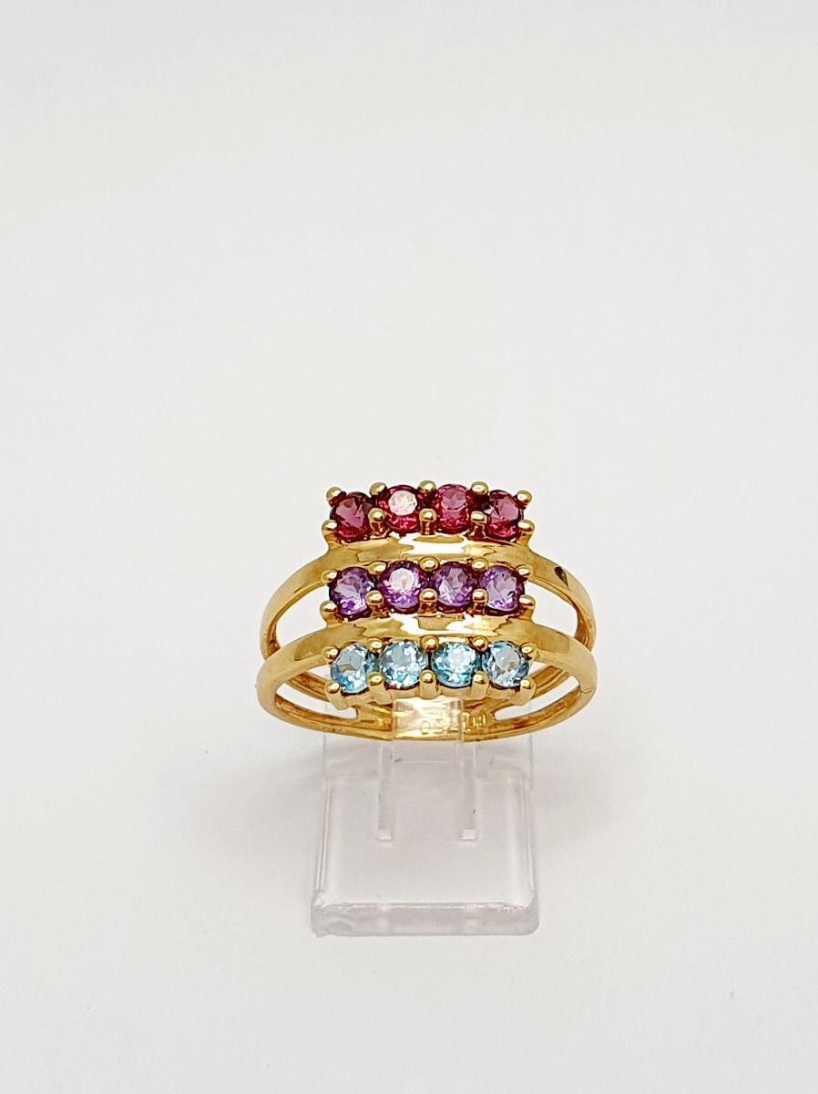 Yellow gold ring with 0.34ct rhodolite, 0.28ct amethyst, and 0.32ct topaz