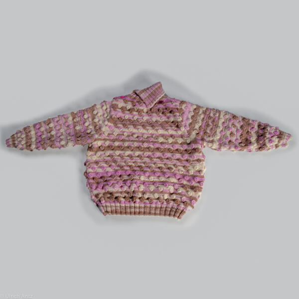 Sweater with studs and button placket, hand-knitted
