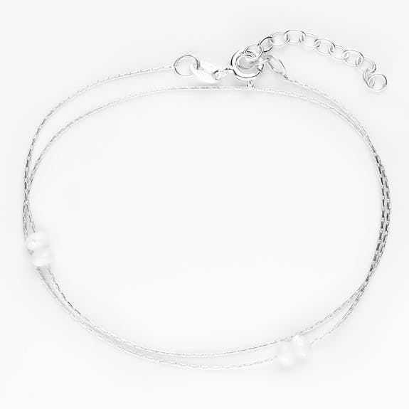 Colette blanc bracelet double tour dans un oeuf