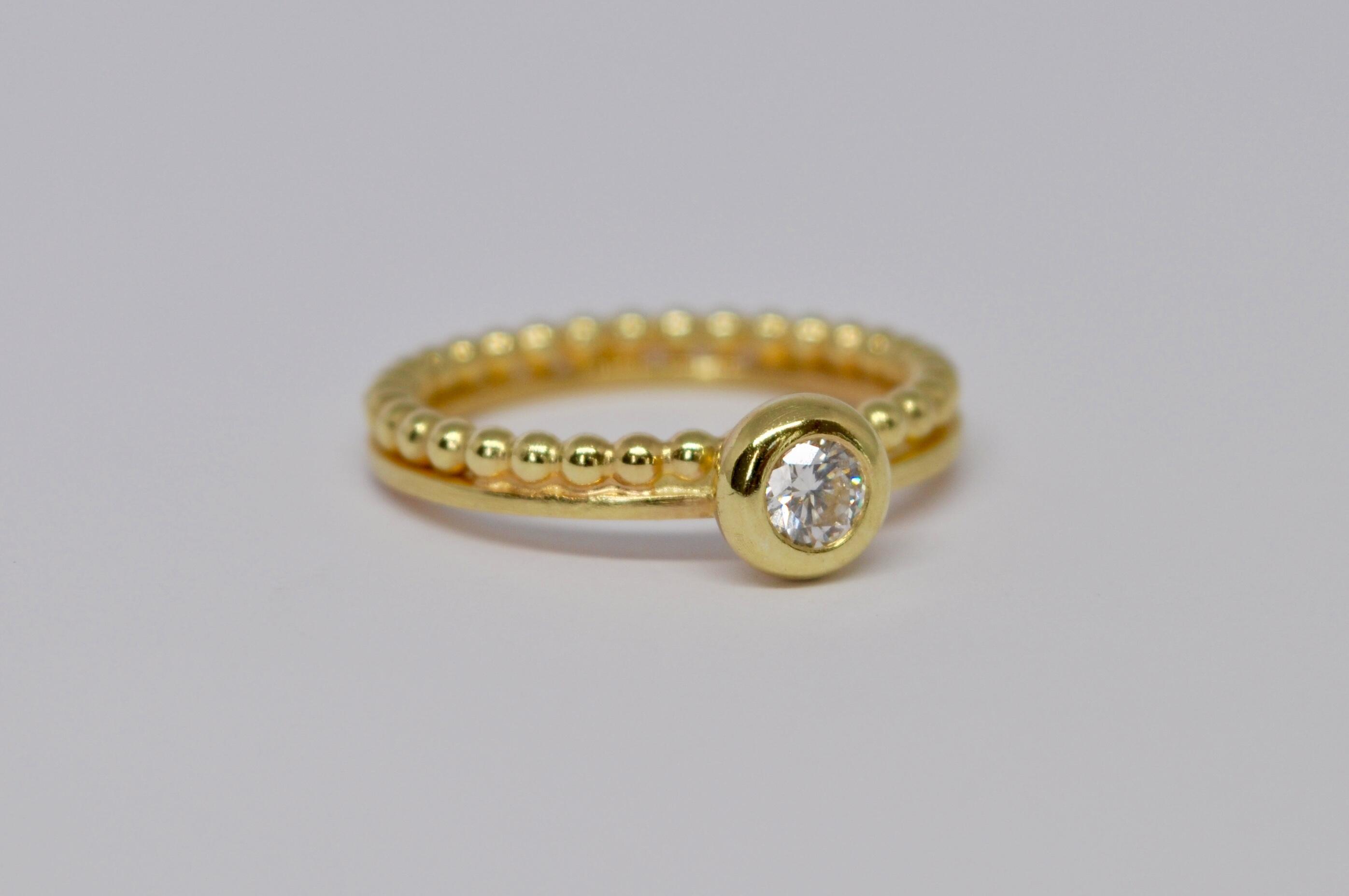 Ring in yellow gold (18 carat) and diamond