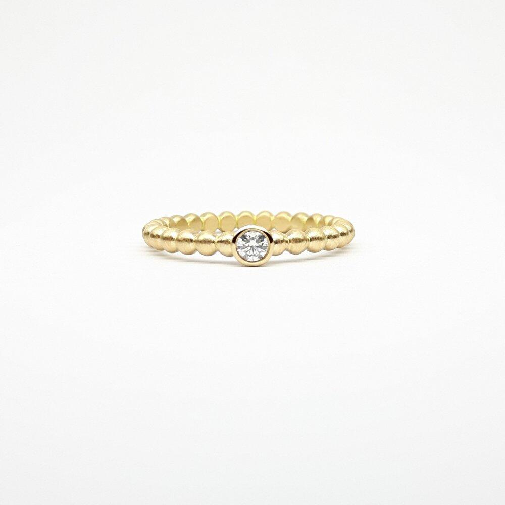 "round around", bague boules en or jaune 18kt et diamant 0,10ct.