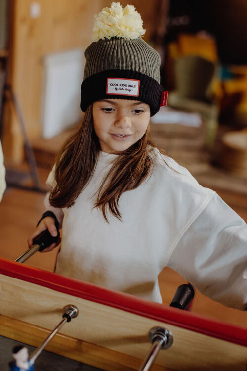 Olive green pom pom hat hotsell