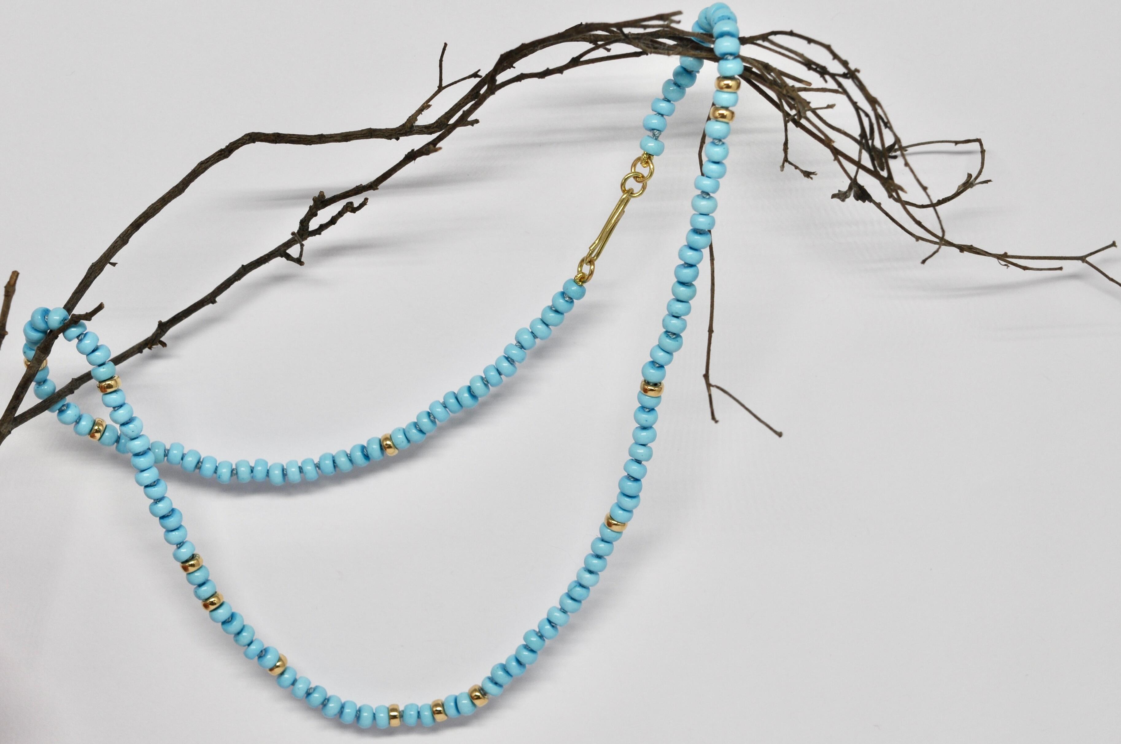 Light blue turquoise necklace, yellow gold