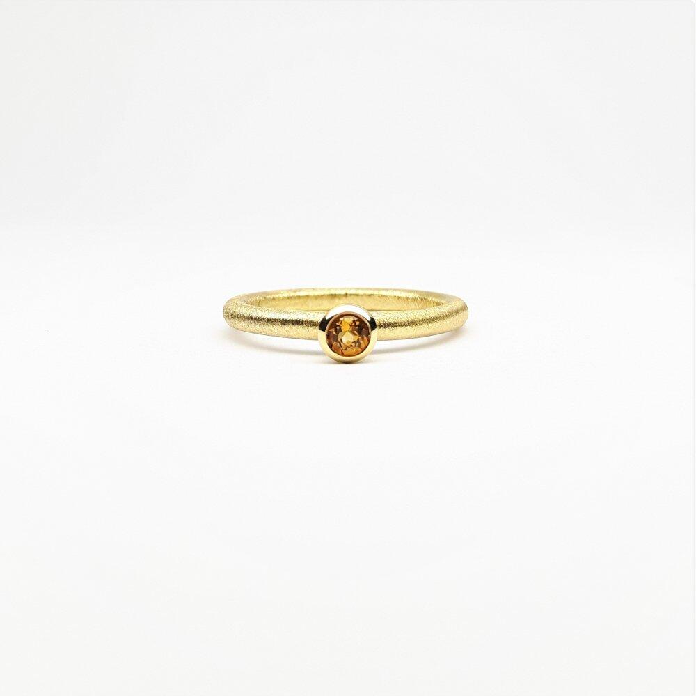 "combiring mini", 18kt yellow gold and citrine Ø3mm.