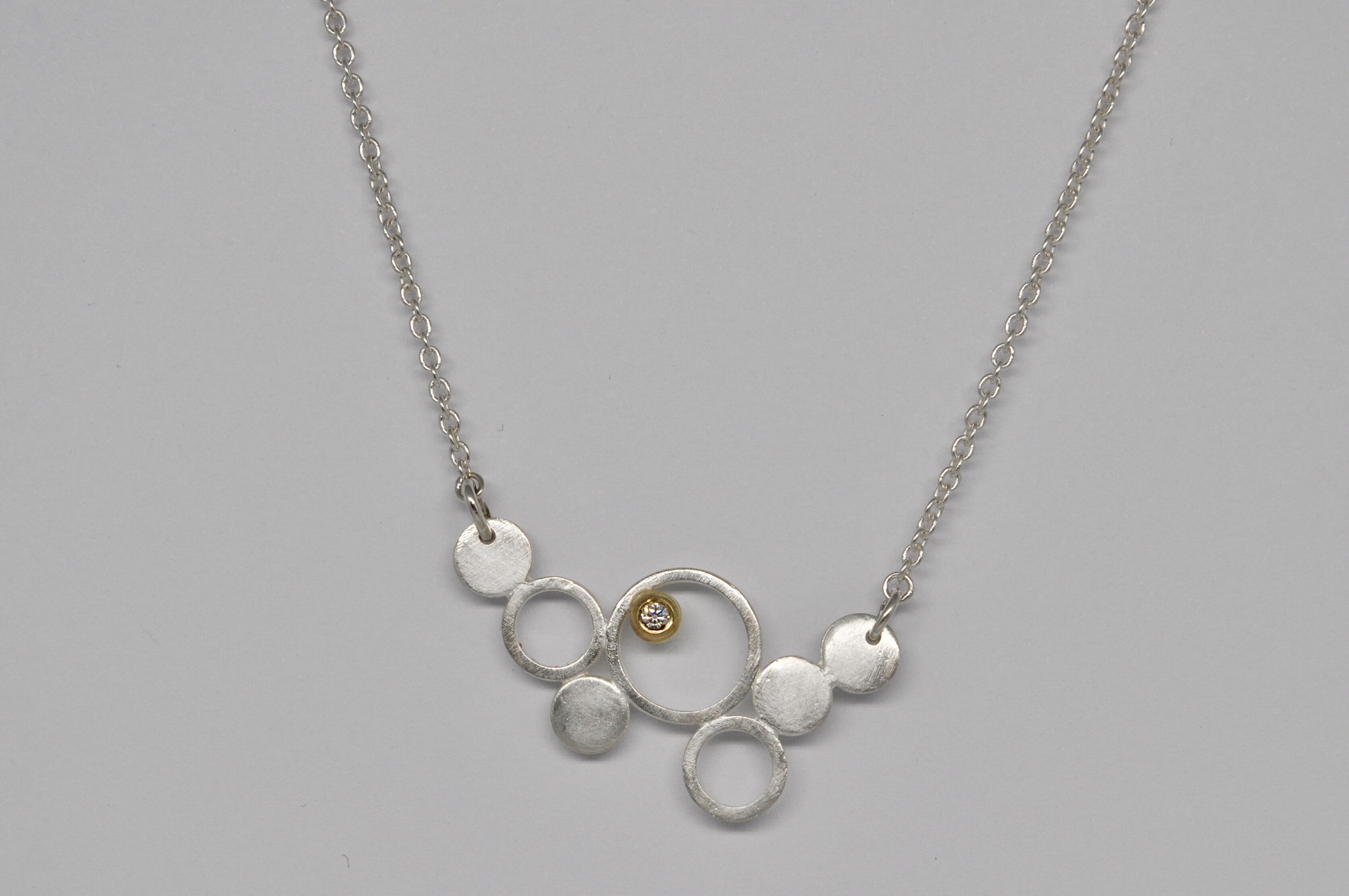 "Bubble" necklace of silver, gold and a diamond