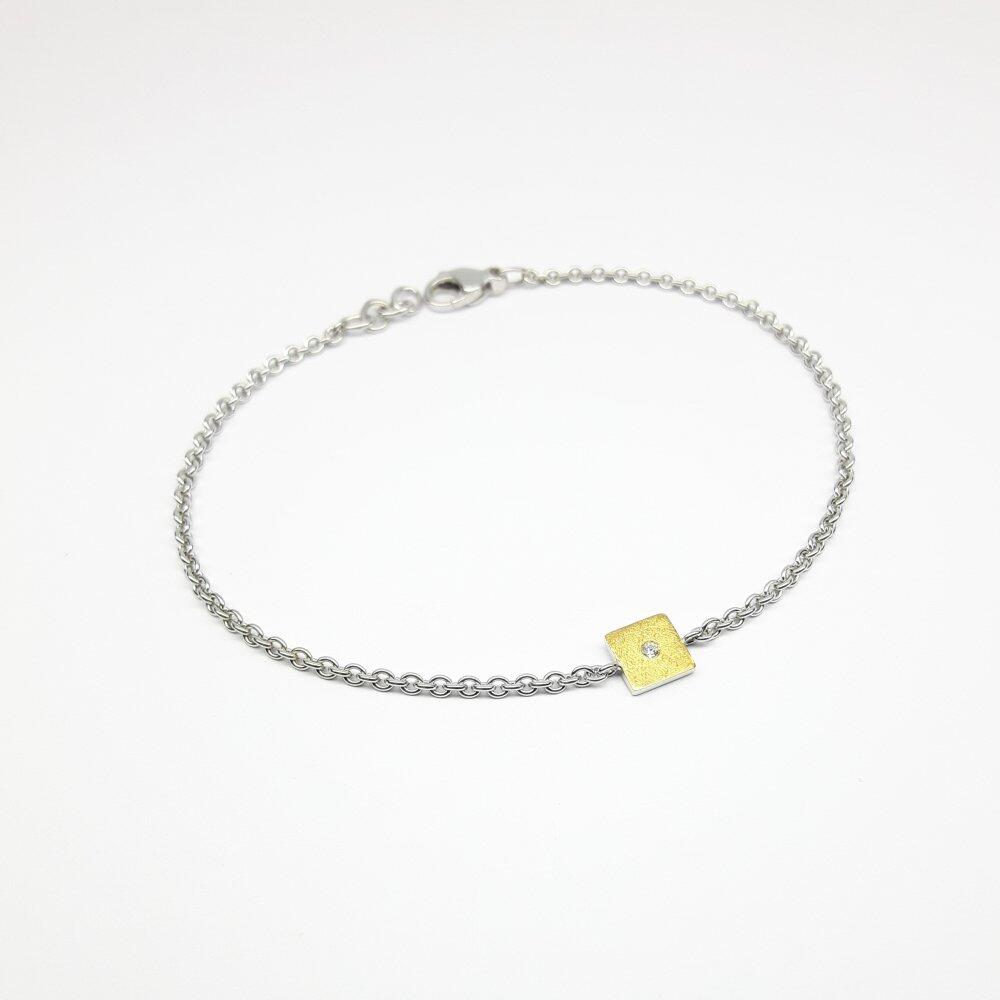 Bracelet en or fin, argent 925/- et brillant.