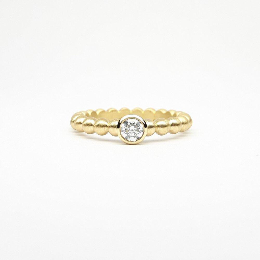 "round around", bague boules en or jaune 18kt et diamant 0,20ct.