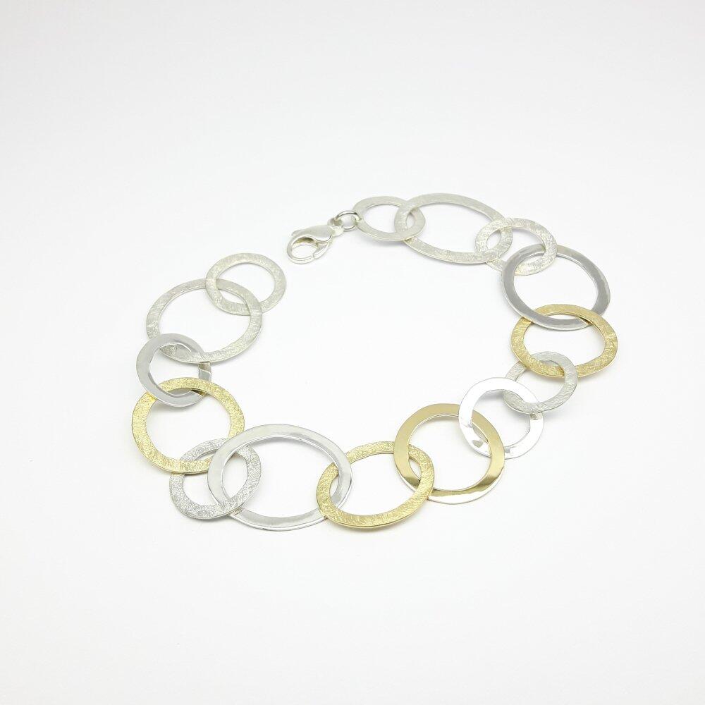 Bracelet en or jaune 18kt et argent 925/- martelé à la main.