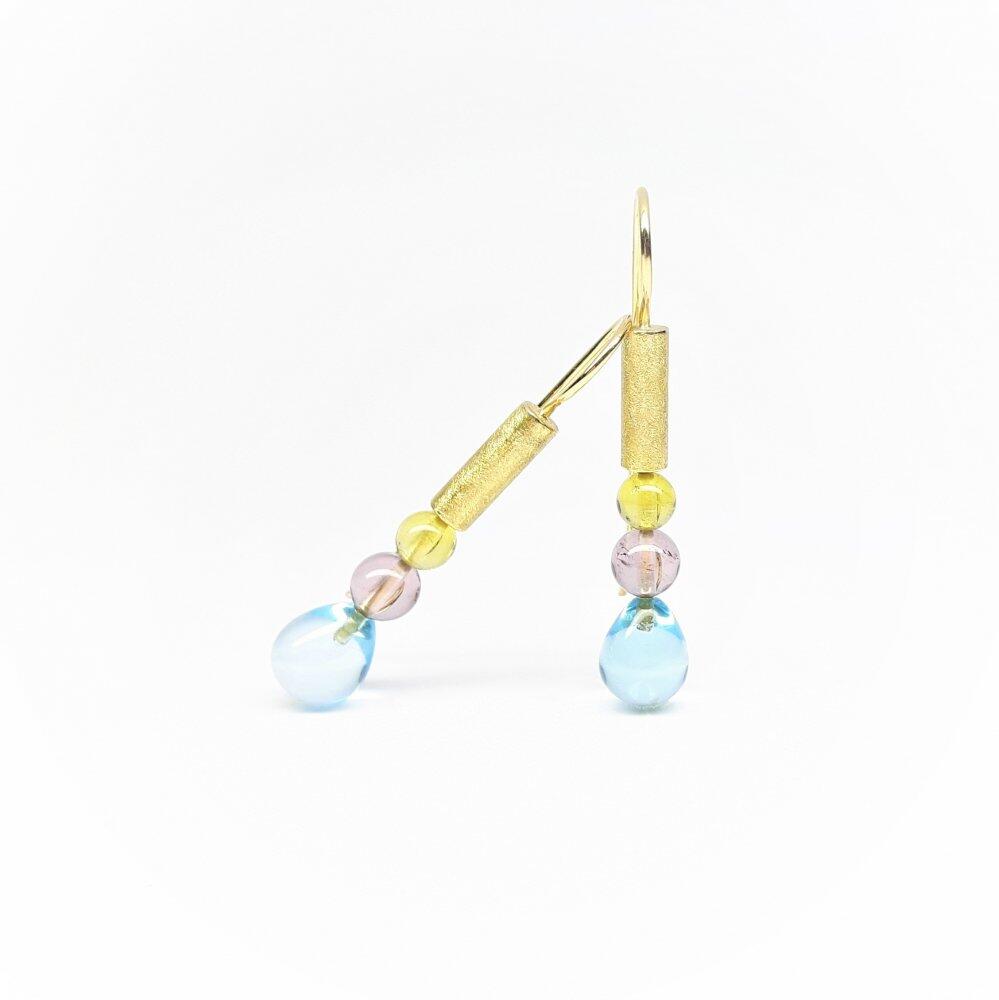 Earrings made of 18 carat yellow gold, tourmaline as well as topaz vampels. Unique piece.