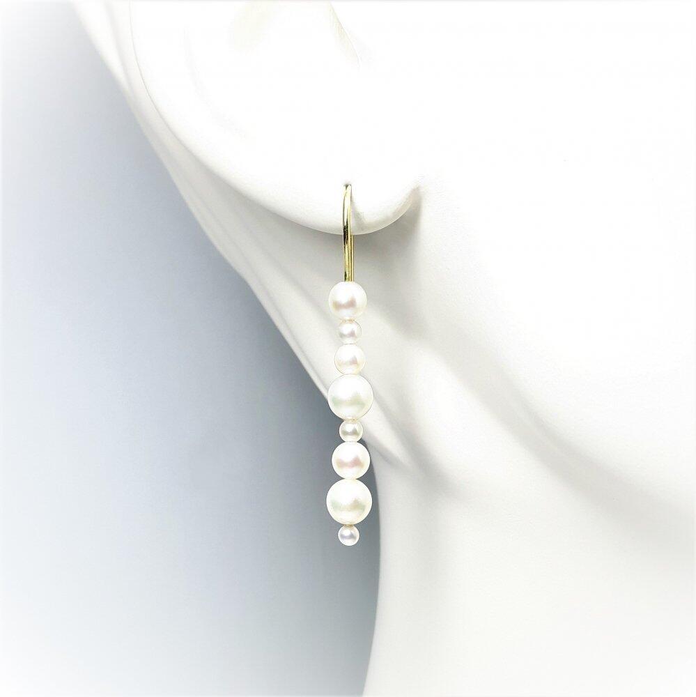 18k yellow gold and white cultured pearl earrings.