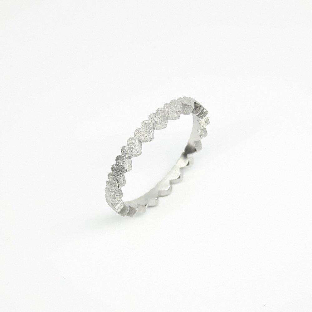 "heartbeats", ring made of 21 hearts, 18kt white gold.