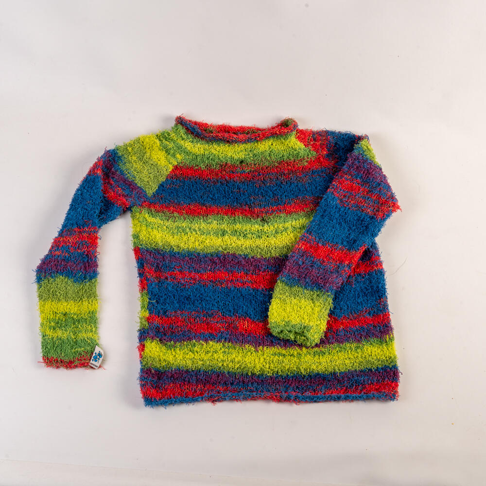 Colorful, fluffy children's sweater, hand-knitted 